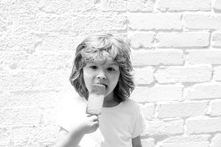 Kids eating ice cream in a pink background.