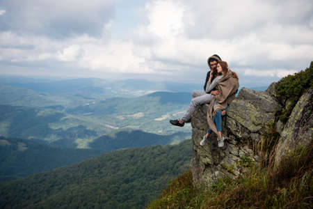 Romantic couple camping on nature background. Adventure for young friends on summer day. Nature...