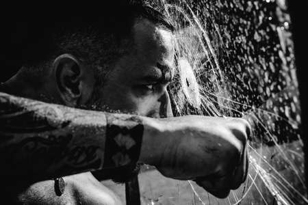 Brutal angry gang man lifestyle, serious handsome guy. Gang man, criminal guy.の写真素材