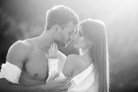 Couple in love, sensual lovers hugging and embracing.