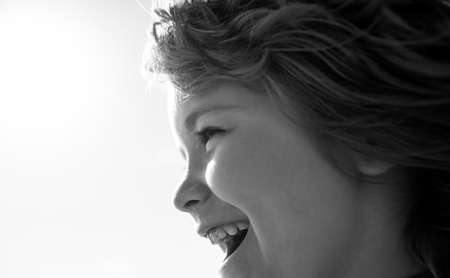 Caucasian child portrait close up. Kids happy profile face.の写真素材