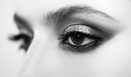 Advertisement, magazine. Beauty woman face. Beautiful young girl in studio on gray background.の写真素材