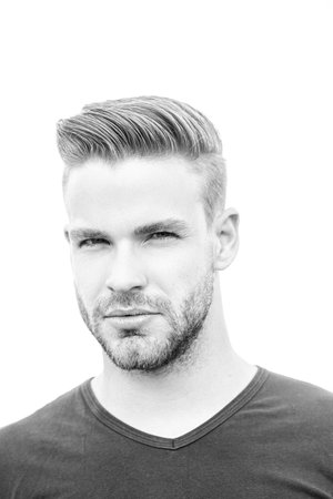 Serious man portrait. Young mans face. Faces portraits. People emotions. Serious gay. Lgbtq, pride, lgbt.の写真素材