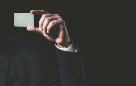 Hand holds a credit card.の写真素材
