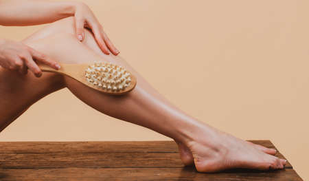 Woman legs with clean skin. Female leg without cellulite. Laser removal treatment. Anti-cellulite body massage. Spa and wellness, plastic surgery, body care, aesthetic cosmetology.の写真素材