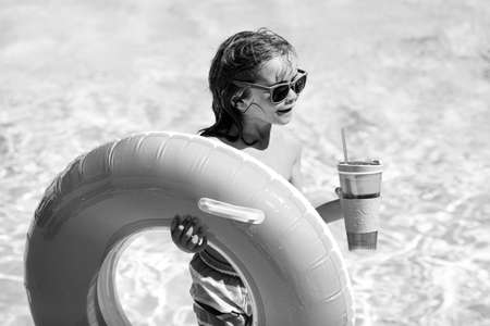 Summer kids cocktail party in watter pool in the summer.