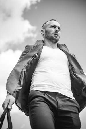 Portrait of handsome readhead man. Stylish young man looking away.の写真素材