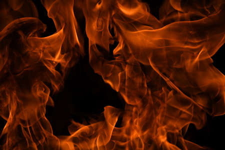 Fire blaze flames on black background. Fire burn flame isolated, abstract texture. Flaming explosion...