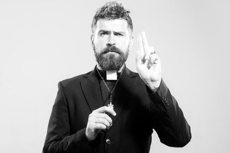 Portrait of priest with pray. Monk man oblation. Senior religion holy male with a confident expression. Isolated.の写真素材