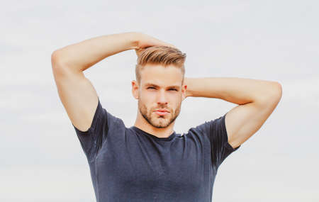 Portrait of handsome man. Fashion style gay guy. Isolated. Mans shampoo.の写真素材