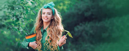 Spring design with beautiful woman face for banner or website header, copy space. Garden woman with tools.の写真素材