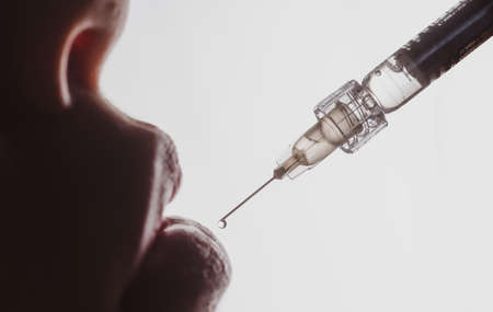 Cosmetology Treatment. Lip augmentation. Hyaluronic acid injection. Age changes. Lips syringe female mouth.の写真素材