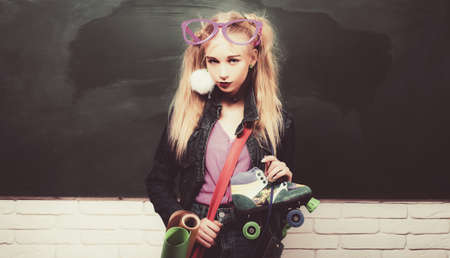 Creative teen. Fashionable girl creative student chalkboard background. Back to school. Stylish...