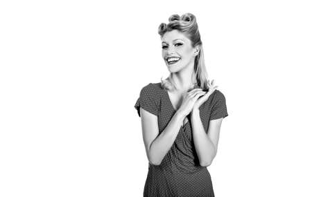 Caucasian model posing in retro fashion and vintage concept. Studio shot on white background....