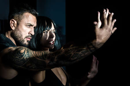 Romantic couple dating. Couple in love. Beautiful loving couple in shadow.