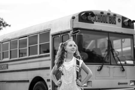 School Bus: Pretty Teen Student Boarding Bus For School. Home education.の写真素材