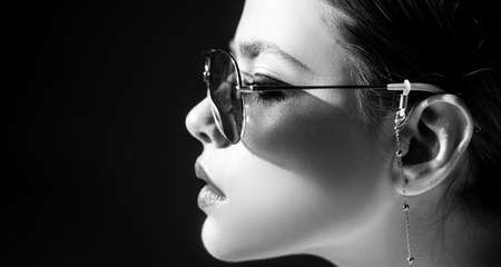 Closeup girl with sunglasses. Fashion trendy style woman with glasses. Beautiful female model.