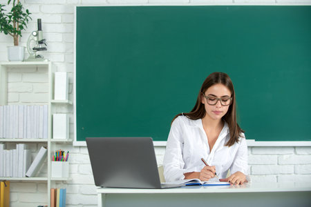 High school student learning english or mathematics in class, online learning at school, distance education.の写真素材