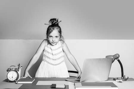 Girl from elementary school. Kids education. School child thinking.の写真素材