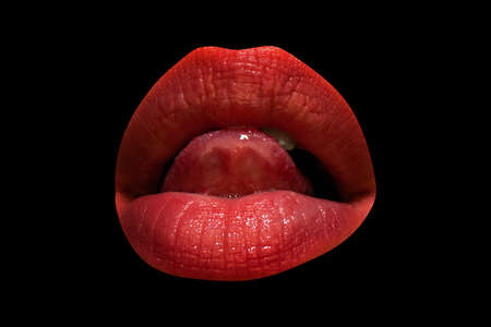 Isolated woman mouth with tongue licking lips with red lipstick.の写真素材