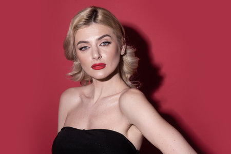 Studio portrait of young beautiful woman. Beautiful girl face. Youth and skin care concept. Visage and cosmetic advertising. No filter unaltered female model face.の写真素材