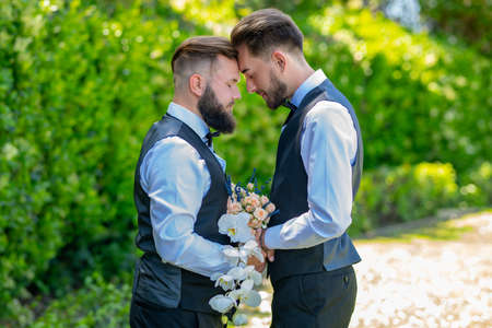 Portrait of happy gay couple on wedding day. Gay marriage. Gay couple wedding. Holidays, Festivals, and Events lgbt concept.の写真素材