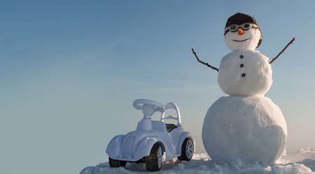 Snowman driver on the snow outdoor background. Christmas banner with snowman. New year greeting card with with snowman.の写真素材