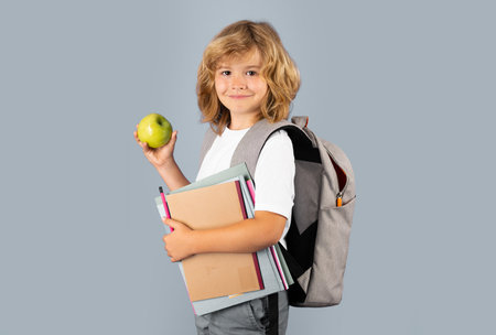School child on isolated background. Kids education, Learning studying and knowledge for children.の写真素材