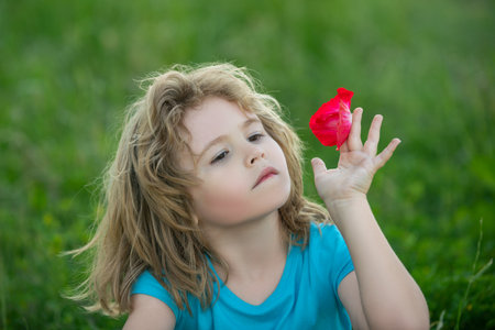 Caucasian child portrait close up. Kids face. Summer mood.の写真素材