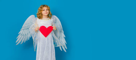 Child with angel wings hold paper heart. Symbol love and valentines day. Valentines day banner. Cute...