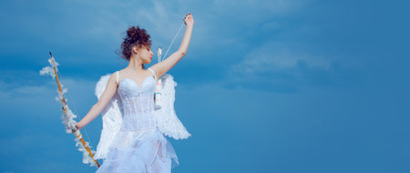 Banner with angel teenager. Cupid girl, cute teen on valentine day with bow arrow shooting. Valentin teenager angel with wings. Arrows of love.の写真素材