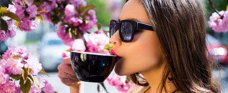 Woman drink coffee. Spring banner for website header. Good morning. Trendy drink latte matcha or...