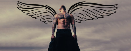 Photo banner of sexy man with wings for valentines day. Seductive face of a sexy man. Macho looking confident. Strong muscular male body, muscles guy. Naked muscular man angel.の写真素材