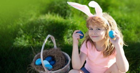 Easter egg hunt. Happy Easter for children. Boy in bunny ears with colorful eggs play and hunting...