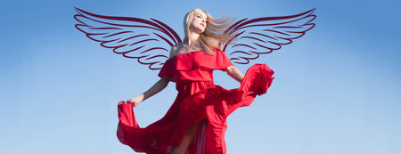 Angel woman with wings. Valentines day banner for website header design. Blonde woman in red dress movement on sky. Fashionable young model in style dress. Fashion woman in summer.の写真素材