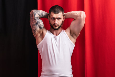 Sexy and naked muscular young man sensual posing. Sexy shirtless male model. Attractive young naked...