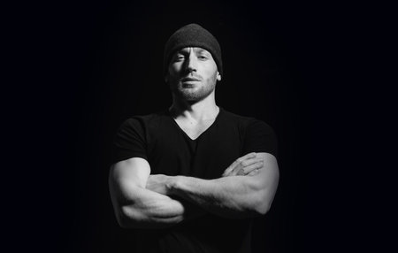 Studio shot of young man looking at the camera.