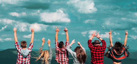 Friends summer travel vacation banner. Group of hikers with arms up on the top of the mountain,...