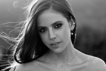 Spring romantic casual woman portrait. Beautiful girl outdoor, close up beauty young female face.