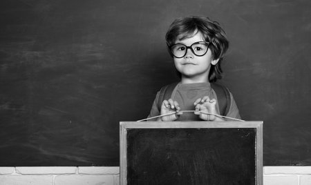 Learning at home. Kids gets ready for school. Happy mood smiling broadly in school. School and education concept.の写真素材