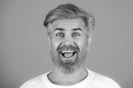 Happy man smile face. Handsome smiling young guy. Positive human emotions.の写真素材