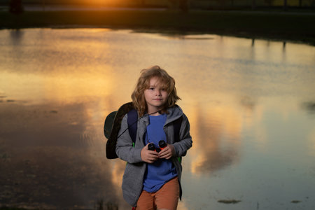 Traveler tourist kid. Child with backpack, traveller or explorer. Concept of exploration and...