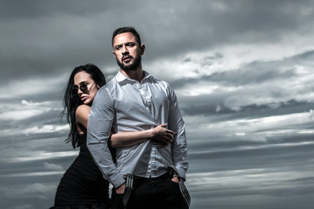 Sensual passionate couple enjoying tenderness and intimacy. Young sexy couple. Romantic lovers. Portrait of a sensual couple in love. Young sexy couple embracing. Loving coupl hugging.の写真素材