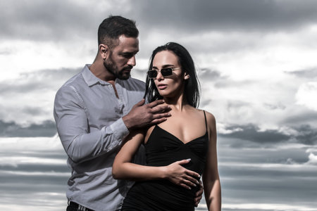 Sexy moments. Romantic couple in love dating. Man embracing woman in the tender passion. Sexy couple in sensual love. Foreplay and love games of sexy couple. Sexy seduction. Erotic people concept.の写真素材