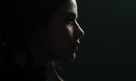 Women profile portrait. Nude makeup. Silhouette girl, side view.の写真素材