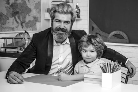 Teacher and pupil. Pupils Education. Learning and education concept. Teachers day. Private kids tutoring.の写真素材