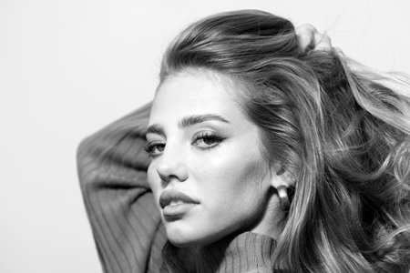 Portrait of beautiful young woman. Sensual beauty female model face close up. Natural beauty woman. Beautiful girl with clean skin, natural make-up.の写真素材