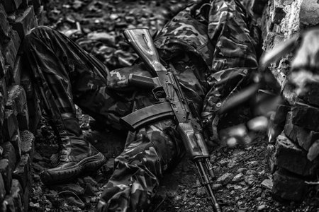 Killed russian or ukrainian soldiers. Dead soldier. Battle of the military in the war. Military soldier or officer with weapons.の写真素材