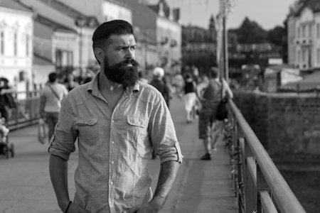 Male city portrait. Hipster outdoors. Walking on town streets.の写真素材