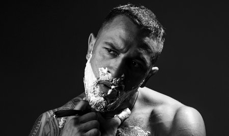 Moustache Wax. Barbershop. Barber shop tools on old wooden background with copy space. Trims. Beard balm. Beard care. Hair style and hair stylist. Fine Cuts.の写真素材